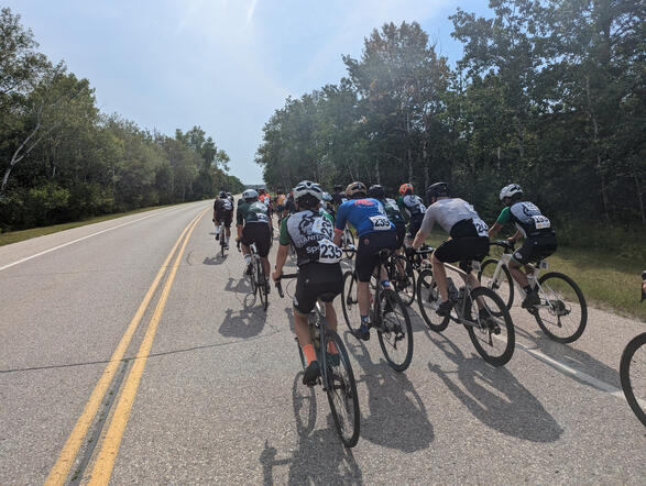 66 riders raced in the 2024 MCA Provincial Road Championships. This is the Cat 5 peloton on their 3rd of 4 laps of Birds Hill Park during the race.