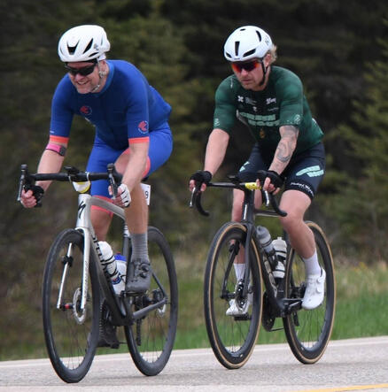 Steph Durocher and Jay Miller share pulls at the 2026 Manitoba Provincial Road Championships at the 2026 Tour de Riding Mountain. Photo Gregory McNeill.